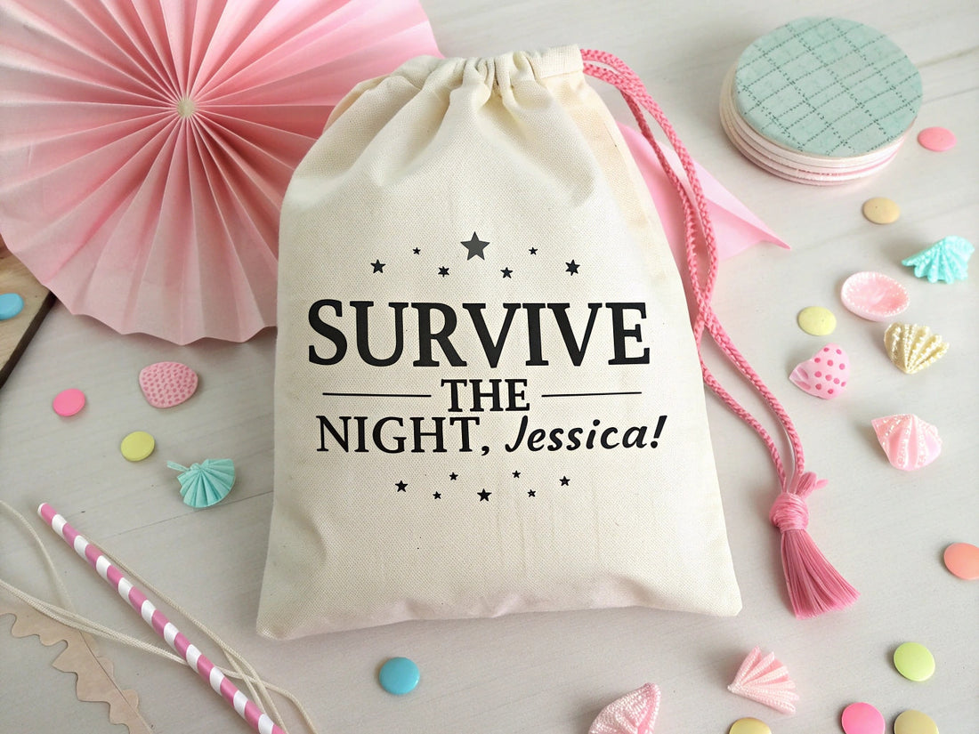 Personalized hangover kit bag with elegant script name and floral print, perfect for wedding favors.