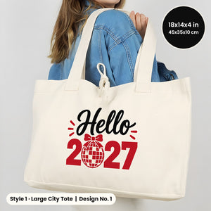 Woman carrying a natural Large City canvas tote bag 18x14x4 inch on her shoulder printed Hello 2027 with a disco ball