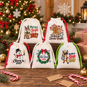 Five cotton drawstring pouches with red, green and natural cords and different Christmas and New Year 2027 designs arranged as bulk favours and gifts for a class, a team or guests