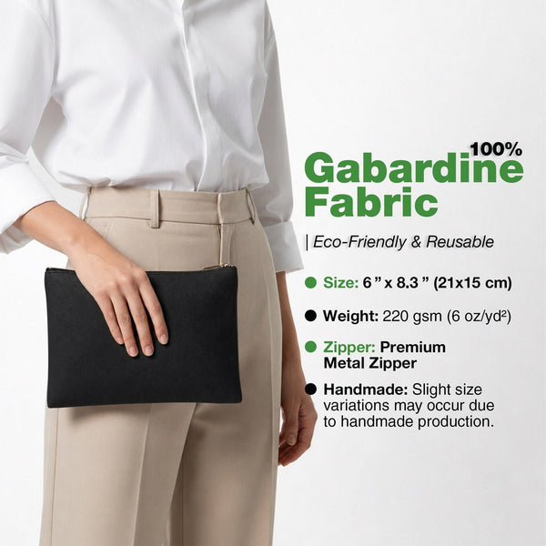 Real photo of a model holding the black cotton gabardine clutch, 6 x 8.3 inches (21 x 15 cm) with a metal zipper