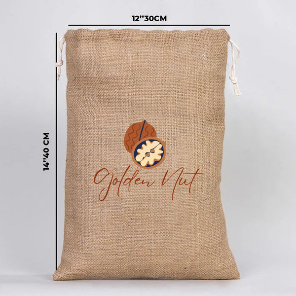 Jute bag with 'Golden Nut' logo and measurements on a light gray background