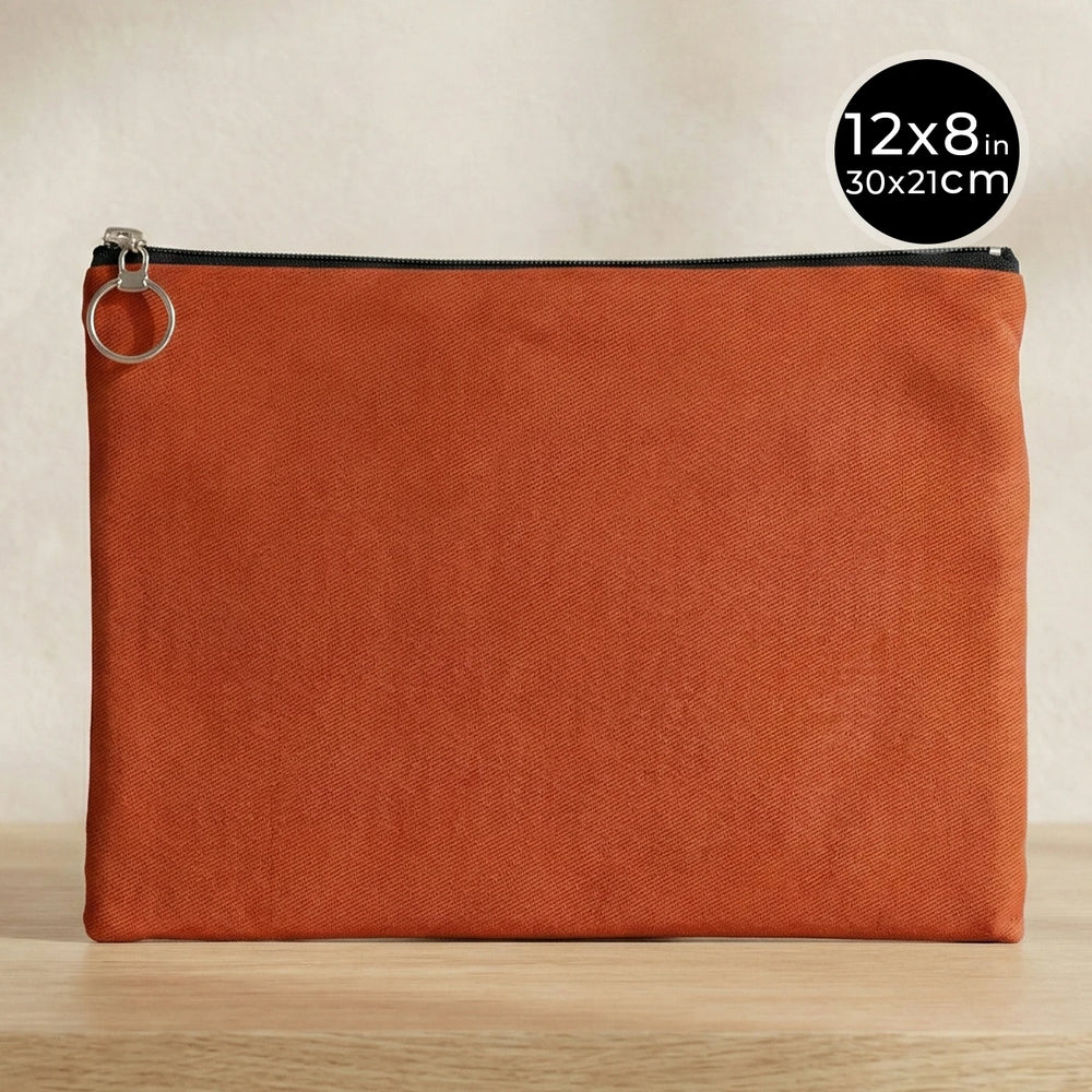Orange pouch with a zipper on a wooden surface, size 12x8 inches.