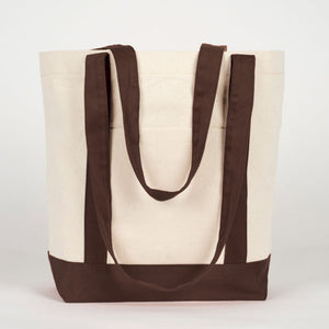 Front view of the blank canvas tote bag with dark brown handles - Pamusan.com