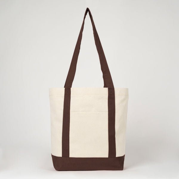 Hanging front view of the canvas tote with dark brown handles - Pamusan.com