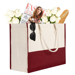 Oversized beige and burgundy canvas tote filled with flowers and groceries – reusable cotton bag perfect for travel
