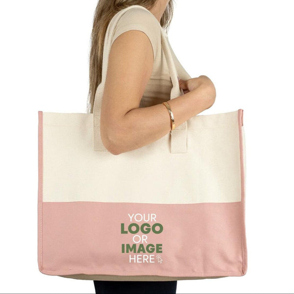 Personalized canvas tote bag with pink bottom and logo
