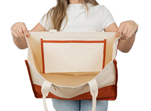 Model displaying large canvas tote bag with front pocket – ideal for bridesmaid gift or summer essentials