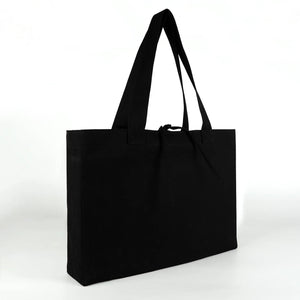 Blank large black canvas tote bag angled side view – Pamusan.com
