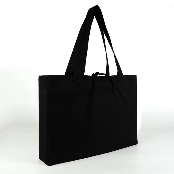 Blank large black canvas tote bag angled side view – Pamusan.com