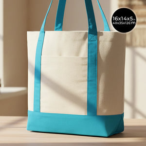 Beige tote bag with blue handles and bottom on a wooden surface